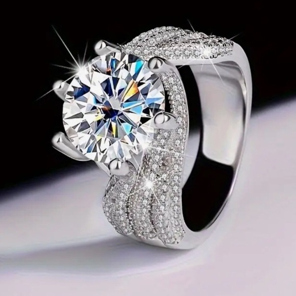 Jewelry - Stunning Size 9,  5 Carat Moissanite Ring S925